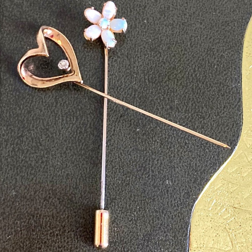 Lovely golden stick pin pair: one genuine opals, the other signed Craft